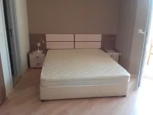 ліжко у вітальні