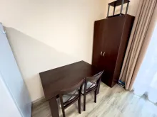 шкаф и обеденный стол