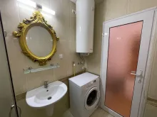 Стиральная машина в ванной комнате