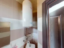 Водонагреватель в ванной комнате