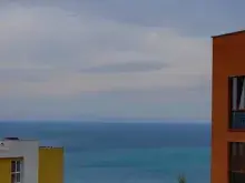 Частичный вид на море из квартиры