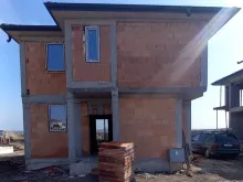 Двухэтажный дом на этапе строительства