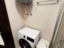 Стиральная машина в ванной комнате