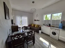 Magnolia Residence-6 | Двухкомнатная квартира: гостинная, кухня