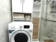Комбинирана баня с тоалетна и душ кабина